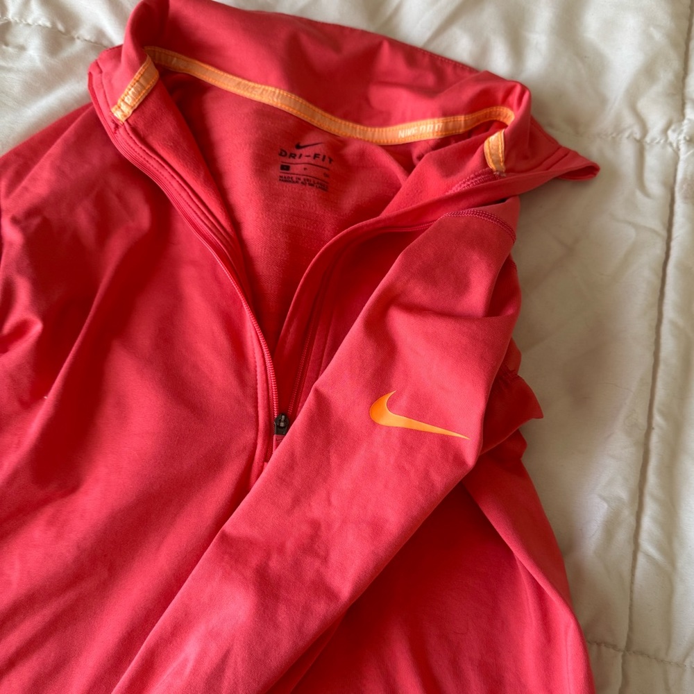 Nike Pro Dry fit pullover . coral and orange size small, good condition